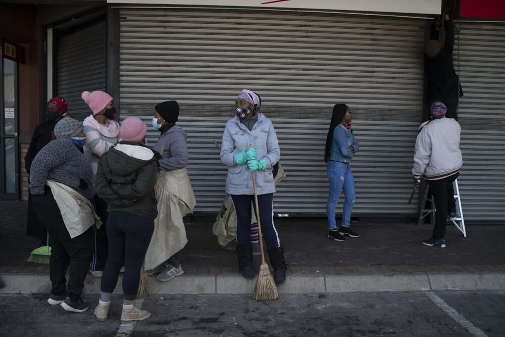 Volunteers clean up after riots in Johannesburg